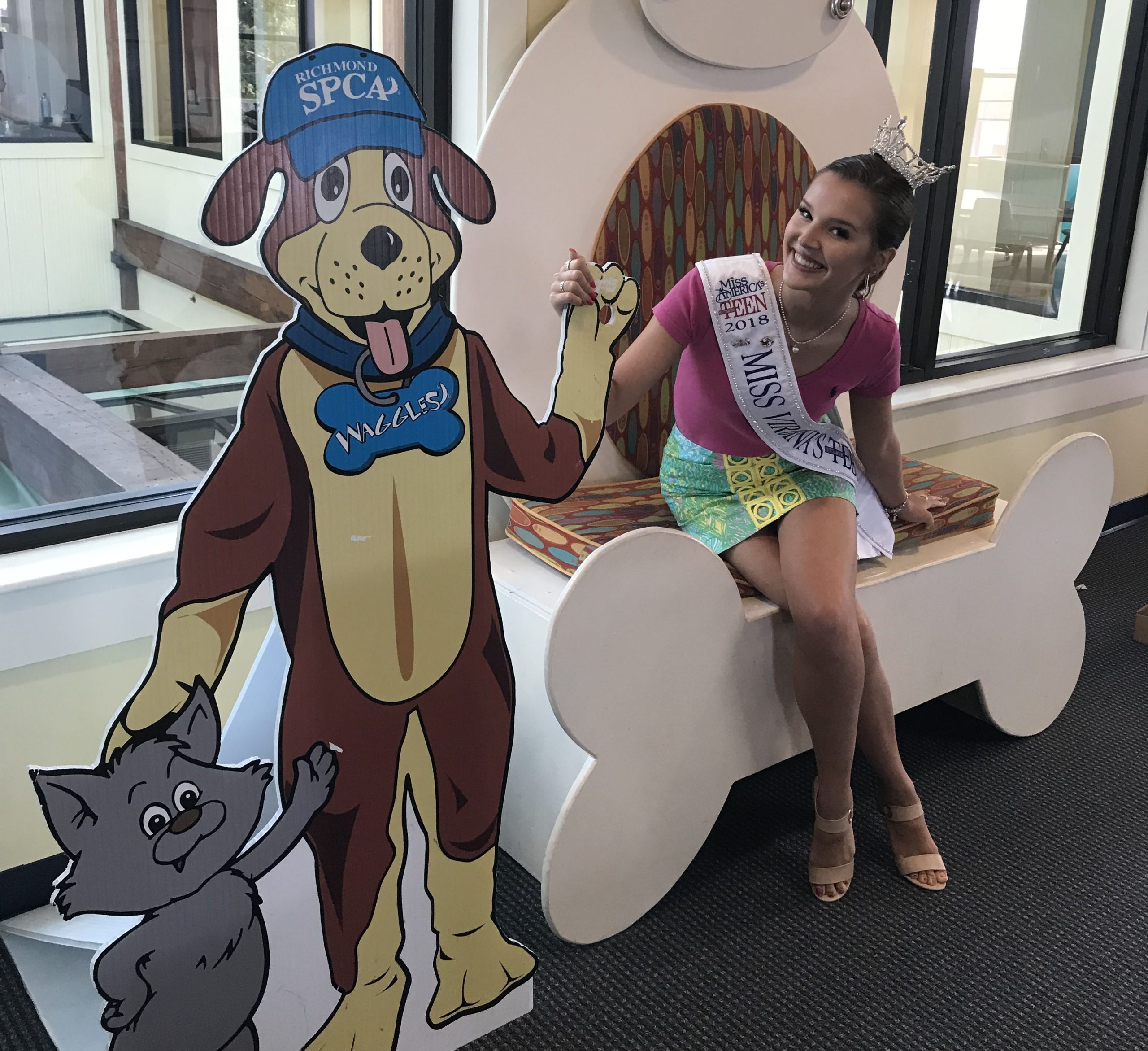 Emily Kinsey, Miss Viginia's Outstanding Teen, wearing sash and crown at the Richmond SPCA